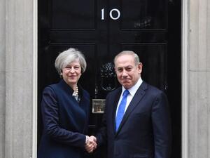 British Prime Minister Theresa May (left) shakes hands with Israeli Prime Minister Benjamin Netanyahu at 10 Downing Street in London on February 6, 2017. (AFP/File)