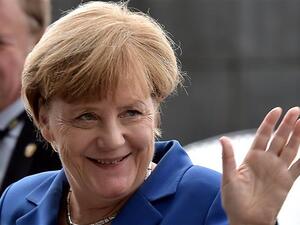 German Chancellor Angela Merkel waves upon her arrival at the European Parliament in Strasbourg, France. (AFP/File)