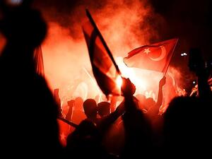 Pro-Erdogan supporters gather at Taksim square in Istanbul to support the government on July 16. (AFP/File)