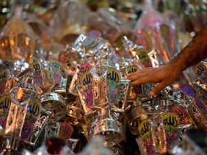 An Egyptian man selects a traditional lantern known in Arabic as "Fanous". (AFP/File)