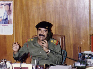 This handout dated 1991 shows toppled leader Saddam Hussein. Doesn't look like much of an Iphone he's got there. (AFP/File)