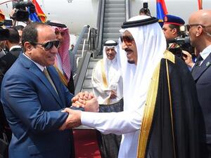 A handout picture released by the Egyptian Presidency on April 11, 2016 shows Saudi King Salman shaking hands with Egyptian President Abdel Fattah el-Sisi before leaving Cairo’s international airport. (AFP/File)
