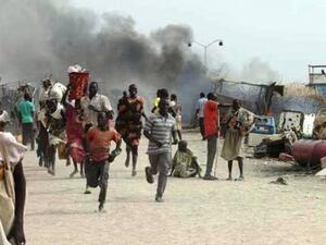 South Sudanese civilians flee fighting in an United Nations base in the northeastern town of Malakal on February 18, 2016, where gunmen opened fire on civilians sheltering inside killing at least five people. (AFP/Justin Lynch)