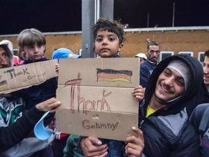 Refugees arrive at main train station in Munich, Germany. (AFP/File)