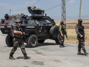 Turkish soldiers guard a check point in the troubled southeast of the country. (AFP/Ilyas Akengin)