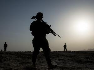 US soldiers patrol near Kandahar Airfield last year. US President Barack Obama has announce that thousands of US troops will remain in Afghanistan into 2017. (AFP/Brendan Smialowski)