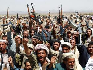 Armed supporters of the al-Houthi movement gather against al Qaeda militants on Aug. 17. (AFP/Mohammed Huwais)