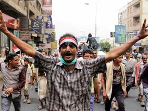 A Yemeni supporter of the Saudi-led coalition against the Houthis demonstrates in Taez on 4 April. (AFP/File)