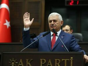 Turkish Prime Minister and the leader of Turkey's ruling party, the Justice and Development Party (AK Party) Binali Yildirim delivers a speech during a meeting of the AK Party at the Grand National Assembly of Turkey in Ankara, on June 28, 2016. (AFP/Fulya Ozerkan)