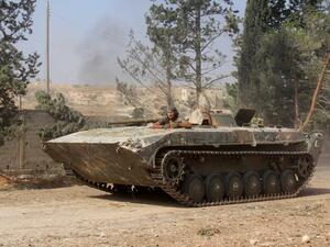 Nusra Front fighters south of Aleppo. They now go by the name Jabhat Fatah al-Sham (AFP/Omar Haj Kadour)