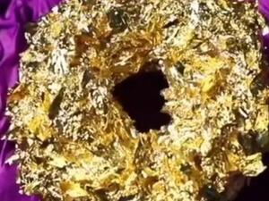 $100 doughnut containing 24-karat gold and Cristal champagne (Twitter)