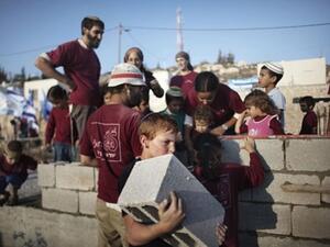 مستوطنون يهود يستأنفون البناء في مستوطنة بالضفة الغربية/أ.ف.ب