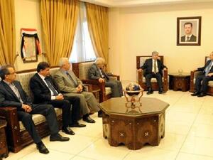 الوفد الفلسطيني خلال لقائه وزير الخارجية السوري فيصل المقداد