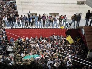 من تشييع عرفات جرادات الى مثواه الاخير/أ.ف.ب