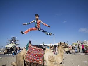 Young Palestinian Mohammed al-Sheikh, 12, shows his skills in Gaza city on April 28, 2016. (AFP/Mahmud Hams)