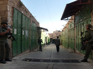 Closed shops on Shuhada street in Hebron, where the activists had been headed (Wikimedia Commons)