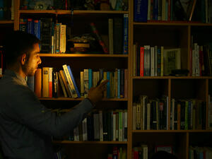 Mossab Abu Toha is struggling to open the first English-language library in Gaza. (AFP/File) 