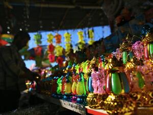 A Palestinian vendor sells lanterns at a market in Gaza City, as the faithful prepare for the start of the Muslim holy fasting month of Ramadan, on May 26, 2017. (AFP/Mohammed Abed)
