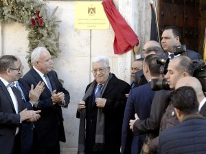 Palestinian president Mahmoud Abbas looks on after he inaugurated the new Palestinian diplomatic mission to the Holy See with Palestinian Ambassador Issa Kassissieh (L) in Rome on January 14, 2017. (AFP/Tiziana Fabi)