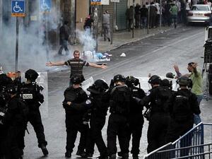 Palestinian protester arguing with Israeli police during clashes in East Jerusalem (AFP/ AHMAD GHARABLI)
