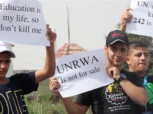 Palestinian demonstrate against the planned cuts in services related to the United Nations Relief and Works Agency (UNRWA)’s education program. (AFP/ File)