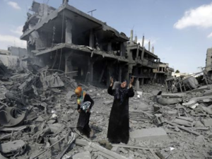 A Palestinian woman mourns in the midst of destroyed buildings in the Gaza Strip in 2014 - almost entirely constructed of concrete. (AFP/File)