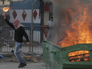 Molotov cocktail during clashes with Israeli security forces (AFP/File Photo)