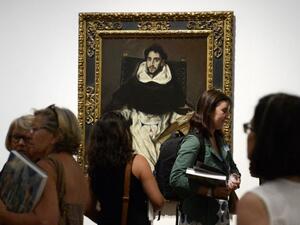 People look at the painting "Fray Hortensio Felix Paravicino" (1608-13) by El Greco during the presentation to the press of the exhibition dubbed the "El Greco and Modern Painting" at the Prado National museum in Madrid. (AFP/File)