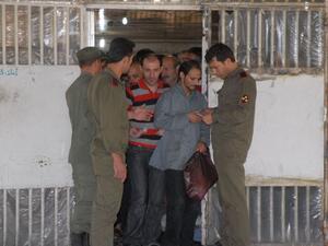 Inmates are released from the Damascus Central Prison in June 2014 after an amnesty was announced (AFP Photo)
