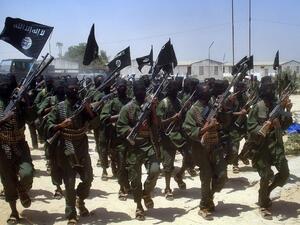 Al-Shabaab militants perform military drills at a village in Lower Shabelle region, some 25 kilometres outside Mogadishu on February 17, 2011. (AFP/Mustafa Abdi)