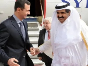 امير قطر يستقبل الرئيس السوري لدى وصوله الى الدوحة