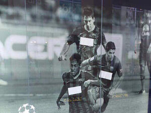 A photo from a UAE mall appears to show an advertisement for Barcelona football club censored, with the Qatar Airways sponsor covered. (Twitter/ Raed Al-Emadi)