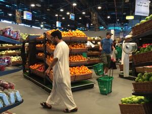 Customers are seen shopping at the al-Meera market in the Qatari capital Doha, on June 10, 2017. Saudi Arabia, Egypt, the UAE and Bahrain announced on June 5 they were cutting diplomatic ties and closing air, sea and land links with Qatar, giving Qataris within their borders two weeks to leave. (Stringer/AFP)
