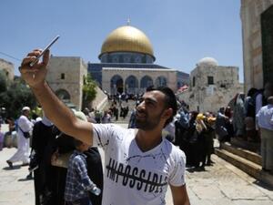 Muslims attend prayers during Ramadan in Jerusalem (Ahmad Gharabi/AFP)