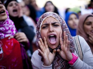 Organized by a coalition of 16 feminist NGOs , hundreds marched in the name of female representation in Egypt's government. Organized by a coalition of 16 feminist NGOs , hundreds marched in the name of female representation in Egypt's government.