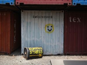 'Turn that frown upside down' - Perhaps wearing a badge of dishonor isn't the best way to beat off negative opinions.