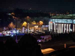 Turkish emergency workers, police officers and forensic work on the site where a car bomb exploded near the stadium of football club Besiktas in central Istanbul on December 10, 2016. (AFP/Getty/Ozan Kose)