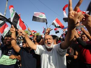 Sadrists rally in Baghdad on July 15 to protest corruption. (AFP/Ahmad al-Rubaye)