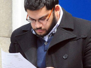 Suheil Ahmad exiting a court hearing. [shutterstock]