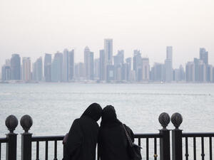 Two girls look out at the Doha skyline. Qatar's hydrocarbon growth is not what it used to be. But its non-oil growth has shot to over 10 percent (Albawaba/J. Zach Hollo) Two girls look out at the Doha skyline. Qatar's hydrocarbon growth is not what it used to be. But its non-oil growth has shot to over 10 percent (Albawaba/J. Zach Hollo)