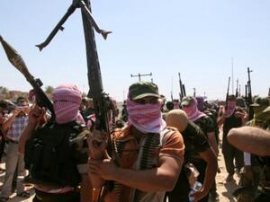 مقاتلون من العشائر السنية في الرمادي/أ.ف.ب