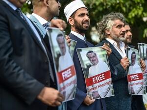 Photos of missing journalist Jamal Khashoggi during a demonstration in front of the Saudi Consulate in Istanbul. (AFP/File)
