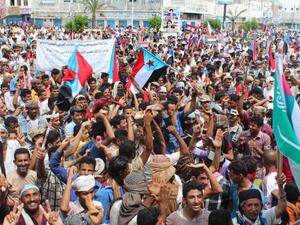 Supporters of the southern separatist movement wave the movements flag during a rally in Yemen. (AFP/File)