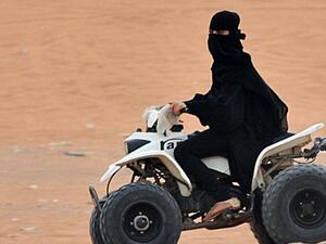 A Saudi woman drives an all-terrain vehicle near Riyadh, April 5, 2013. (AFP/Fayez Nureldine)