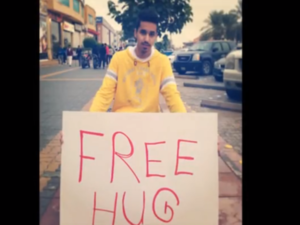 A snapshot of the "Free Hugs" campaign taking over the Riyadh streets. (Via YouTube)