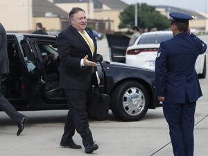 US Secretary of State Mike Pompeo heads to his plane to depart for meetings with Crown Prince Mohammed bin Salman in Saudi Arabia from Joint Base Andrews, Maryland on October 15, 2018. (LEAH MILLIS / POOL / AFP)
