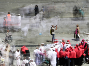 On the third day of the annual Hajj pilgrimage shows pilgrims leaving after throwing the final pebbles in the symbolic "stoning of the devil" ritual, in Saudi Arabia's holy city of Mecca. 

KARIM SAHIB / AFP