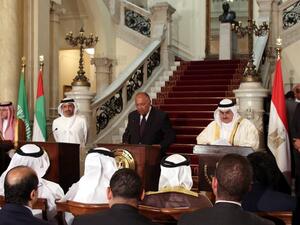 Egyptian Foreign Minister Sameh Shoukry (C) reads a statement while giving a joint press conference with his Saudi, Emirati and Bahraini counterparts on July 5 2017 (Khaled Elfiqi/Pool/AFP)