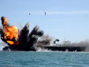 Iran's Revolutionary Guards attack a naval vessel during an exercise in the Strait of Hormuz on February 25, 2015 (AFP)