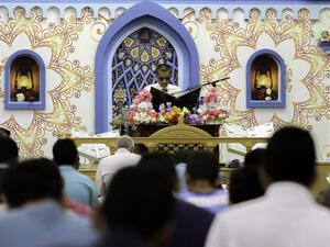 Quran is read in Qatif on the first day of Ramadan. (AFP)